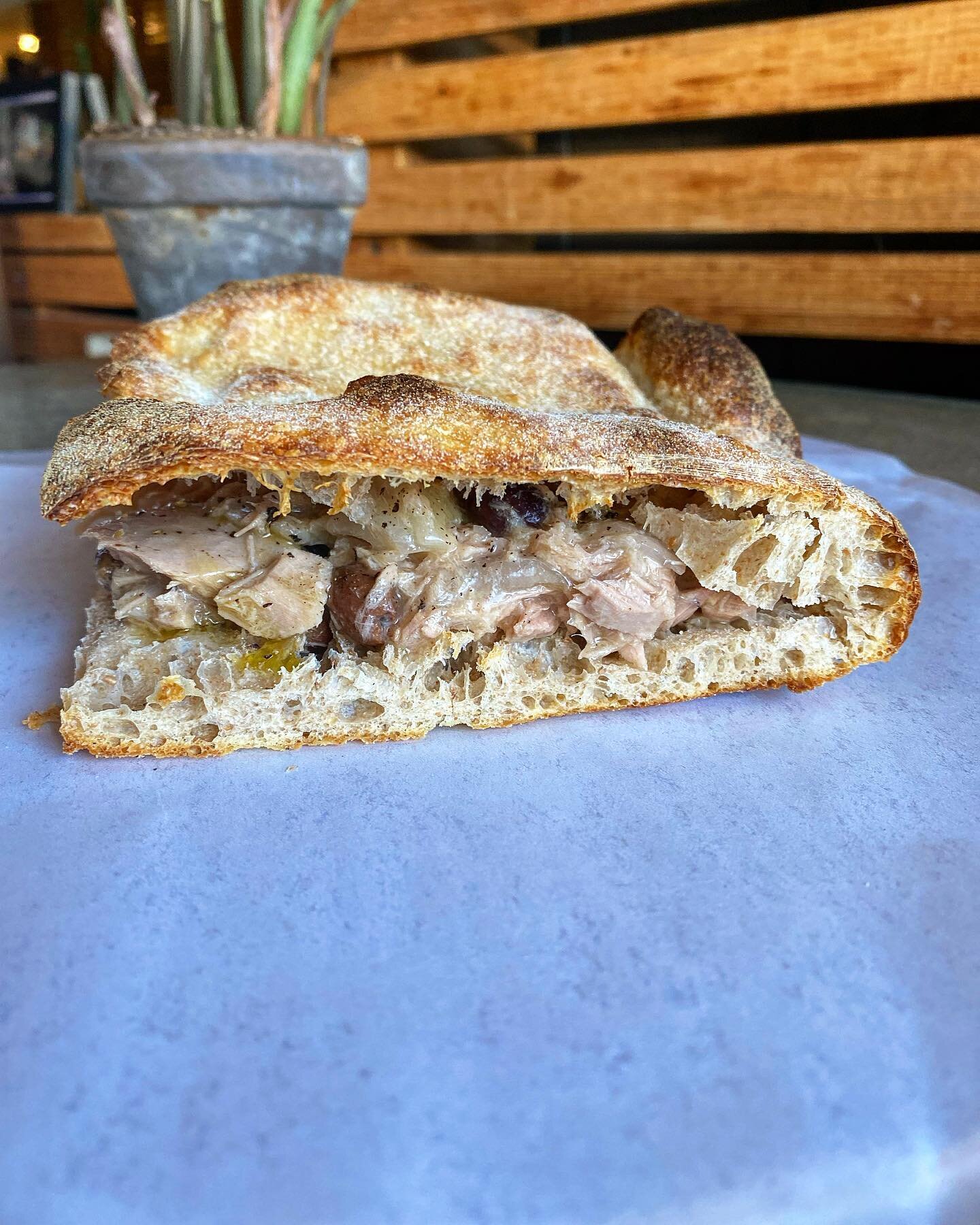TONNARA: ITALIAN TUNA + SWEET AND SOUR ONIONS + TAGGIASCA OLIVES. 
Crazy good Tuna and other good things on our bread that we bake for you. Lunch starts at 11, babies. 
#radicimeansroots #portlandme