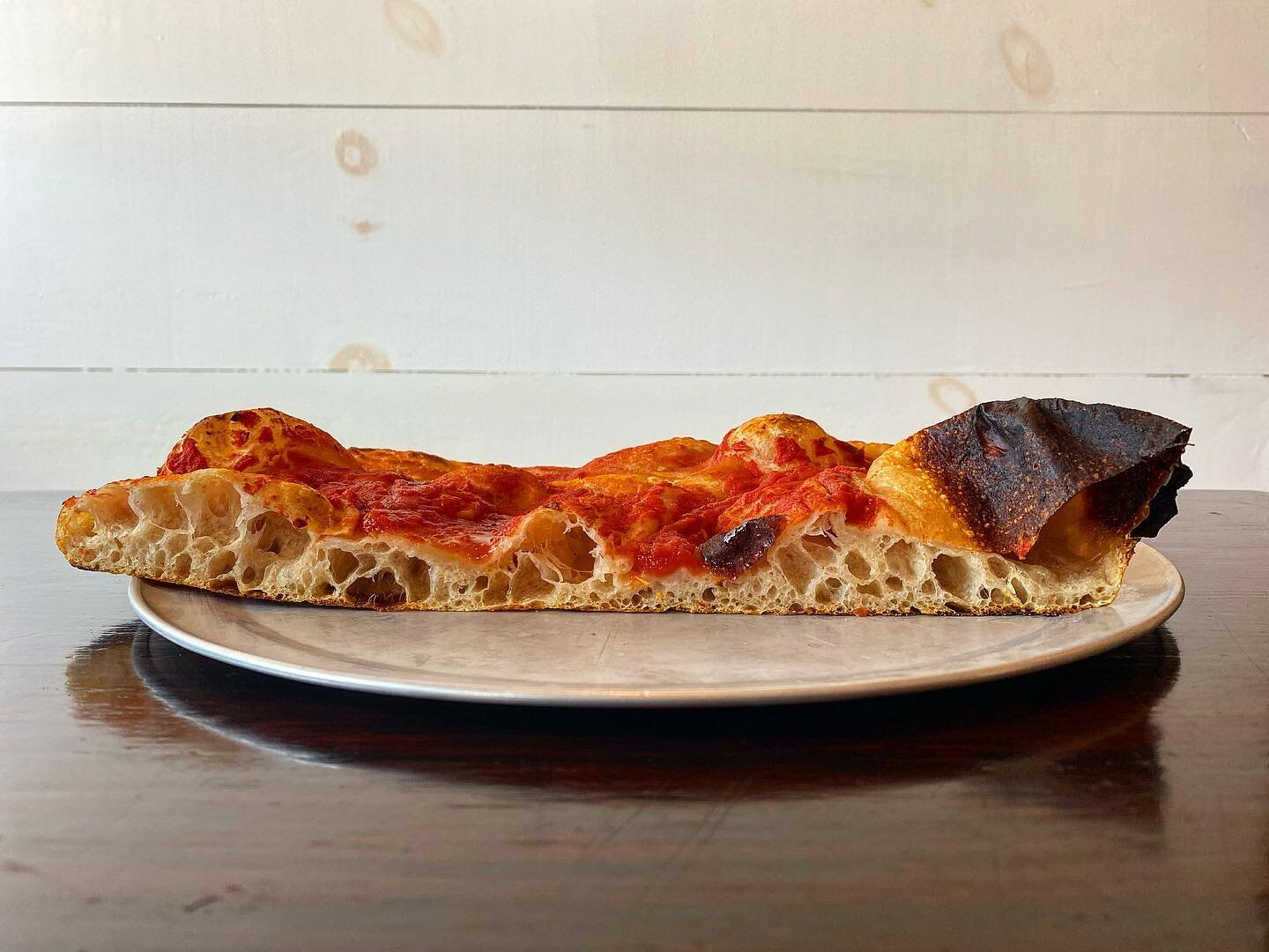 Good bread dressed up as pizza. Or vice versa. Not sure. Open 11a-3p today. 
#radicimeansroots #portlandme #pizza