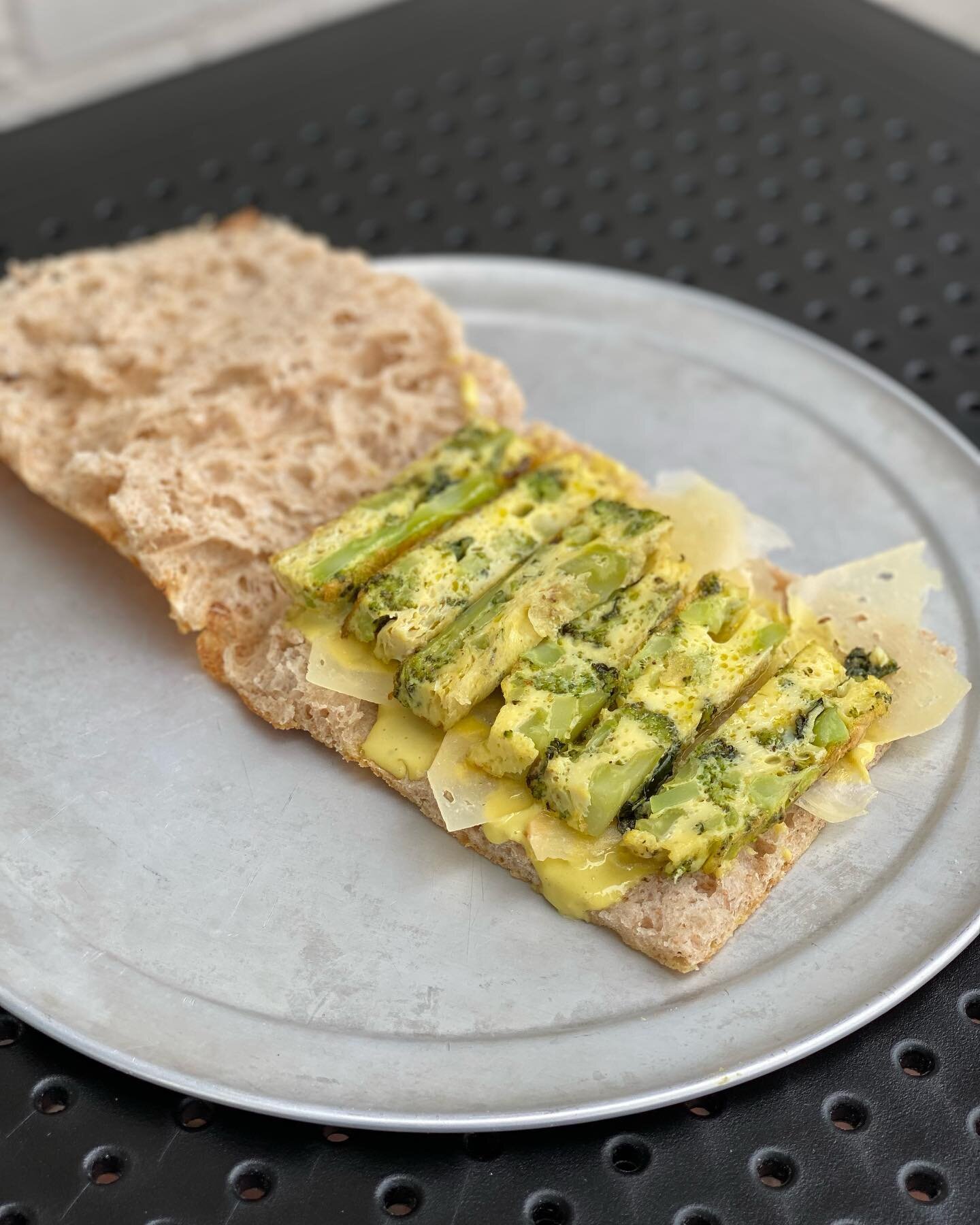Local egg frittata with local broccoli + REAL aioli from local eggs + Pecorino Crotonese that isn&rsquo;t local at all.
Eggs are for lunch. This with a Peroni or Ros&egrave; di Nerello Mascalese is JOY in bread form. 
#radicimeansroots 
#radici 
#p